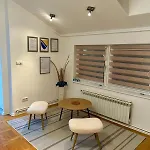 The Warmth Of A With A Fireplace In The Very Center Of