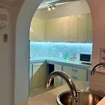 The Warmth Of A With A Fireplace In The Very Center Of