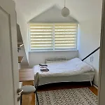 The Warmth Of A With A Fireplace In The Very Center Of
