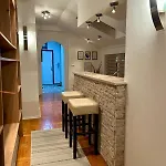 The Warmth Of A With A Fireplace In The Very Center Of Apartman *