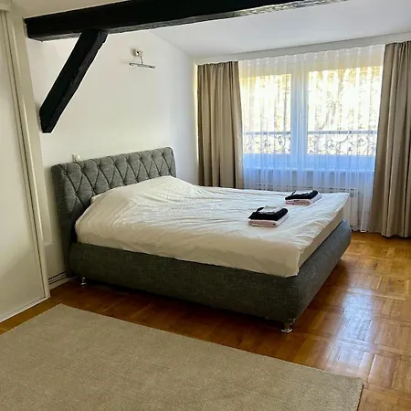 The Warmth Of A With A Fireplace In The Very Center Of